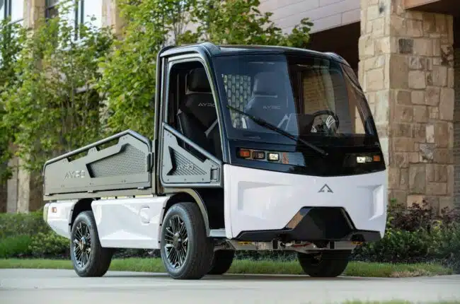 low-speed electric vehicle on a campus quad